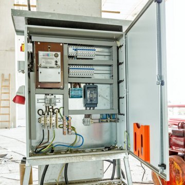 Electricity distribution box with wires and circuit breakers. Fuse box.